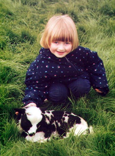 photo of Rosie and a lamb